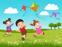 Tre bambini che pilotano gli aquiloni nel parco Tre bambini che pilotano gli aquiloni nel parco