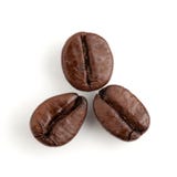 Tre chicchi di caffè immagini stock Tre chicchi di caffè immagini stock
