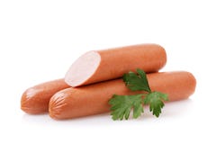 Tre salsiccie fresche con una foglia del prezzemolo isolata immagine stock Tre salsiccie fresche con una foglia del prezzemolo isolata immagine stock