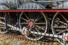 Tres ruedas de una locomotora fotos de archivo libres de regalías Tres ruedas de una locomotora fotos de archivo libres de regalías