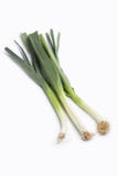 Trois cheminées entières des poireaux verts Image stock Trois cheminées entières des poireaux verts Image stock