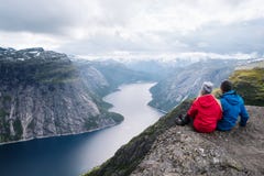 Trolltunga Hiking with view on Ringedalsvatnet lake, Norway stock photos Trolltunga Hiking with view on Ringedalsvatnet lake, Norway stock photos