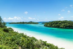 Tropical island beach and clear blue lagoon, Okinawa, Japan Stock Image Tropical island beach and clear blue lagoon, Okinawa, Japan Stock Image