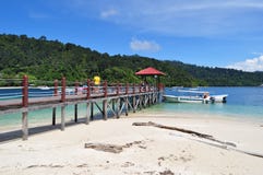 Tropical Island boat and jetty Kota Kinabalu stock photography Tropical Island boat and jetty Kota Kinabalu stock photography