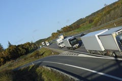 Truck driving convoy stock image Truck driving convoy stock image