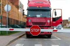 Truck Standing At The Barrier With A STOP Sign. Stock Images