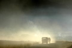 Trucks running in the morning fog Royalty Free Stock Photography Trucks running in the morning fog Royalty Free Stock Photography