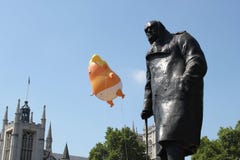 Trump Protest, London, July 13, 2018 : Donald Trump baby blimp protest flys over Westminster, london, July 13, 2018 in London, Eng Royalty Free Stock Photos Trump Protest, London, July 13, 2018 : Donald Trump baby blimp protest flys over Westminster, london, July 13, 2018 in London, Eng Royalty Free Stock Photos
