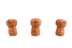 Três cortiça da garrafa do champanhe ou de vinho espumante em um fundo branco isolado perto acima imagem de stock Três cortiça da garrafa do champanhe ou de vinho espumante em um fundo branco isolado perto acima imagem de stock