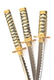 Três espadas japonesas do katana do samurai imagens de stock royalty free Três espadas japonesas do katana do samurai imagens de stock royalty free
