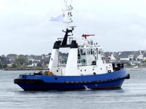 Tugboat in operations royalty free stock photography Tugboat in operations royalty free stock photography