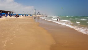 Turister på den södra fältprästöstranden i Texas arkivbild Turister på den södra fältprästöstranden i Texas arkivbild