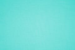 Turquoise colored canvas fabric texture stock image Turquoise colored canvas fabric texture stock image