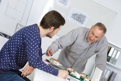 Tutor using learning aids to help student with dyslexia stock photography Tutor using learning aids to help student with dyslexia stock photography