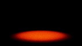 Twinkling Glitter In Golden And Red Shades Lit By A Round Bright Spotlight On A Flat Surface Stock Image Twinkling Glitter In Golden And Red Shades Lit By A Round Bright Spotlight On A Flat Surface Stock Image