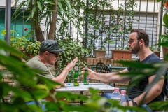 Two albanian mafia guys are smoking and drinking. royalty free stock images Two albanian mafia guys are smoking and drinking. royalty free stock images
