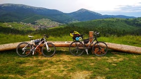Two bicycles on the background of the Carpathian Mountains somewhere royalty free stock photo Two bicycles on the background of the Carpathian Mountains somewhere royalty free stock photo