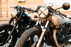 Two black and silver vintage custom motorcycles cafe racers royalty free stock photos Two black and silver vintage custom motorcycles cafe racers royalty free stock photos
