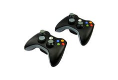 Two Black Wireless Controllers Stock Photography