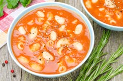 Two Bowls Of Tomato Soup With Pasta, White Beans And Rosemary Stock Photos Two Bowls Of Tomato Soup With Pasta, White Beans And Rosemary Stock Photos
