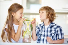 Two children drinking fresh water stock photos Two children drinking fresh water stock photos