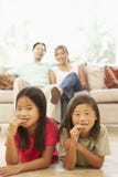 Two Children Eating Cookies At Home royalty free stock photo Two Children Eating Cookies At Home royalty free stock photo
