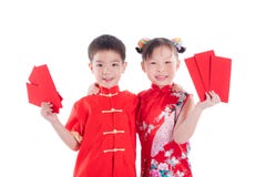 Two Chinese Children In Traditional Costume Holding Red Packet Money Over White Royalty Free Stock Photo