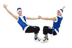 Two Christmas men in blue santa clothes dancing against isolated white in full length. Stock Photography Two Christmas men in blue santa clothes dancing against isolated white in full length. Stock Photography