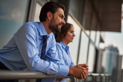 Two Colleagues Standing On Balcony To Have Break Royalty Free Stock Photos Two Colleagues Standing On Balcony To Have Break Royalty Free Stock Photos