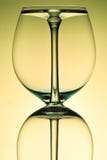 Two empty wineglass for red wine on diffusion lit background in abstract composition with reflection stock photos Two empty wineglass for red wine on diffusion lit background in abstract composition with reflection stock photos