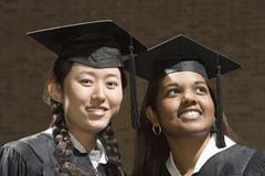 Two female graduates stock photo Two female graduates stock photo