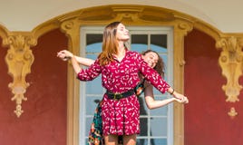 Two girls holding hands and having fun royalty free stock images Two girls holding hands and having fun royalty free stock images