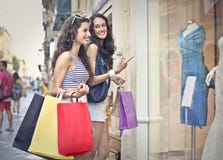 Two Girls Window Shopping Royalty Free Stock Images