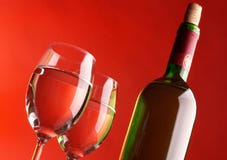 Two Glasses And Bottle Of Wine Royalty Free Stock Photos