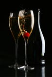 Two glasses of champagne on the black royalty free stock images Two glasses of champagne on the black royalty free stock images