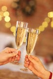 Two glasses of champagne over blur lights background. royalty free stock photography Two glasses of champagne over blur lights background. royalty free stock photography