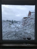 Two glasses of wine on the window overlooking the winter landscape. royalty free stock images Two glasses of wine on the window overlooking the winter landscape. royalty free stock images