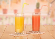 Two Glasses With Orange And Grapefruit Juice Stock Photography