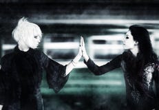 Free Two Goth Women Touching Hands Stock Images - 11479594