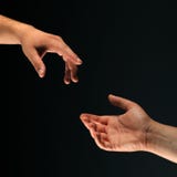 Two Hands Reaching To Each Other Royalty Free Stock Image
