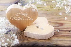 Two hearts on old wood, message happy mothers day Stock Photos Two hearts on old wood, message happy mothers day Stock Photos