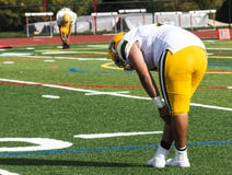 Football players stretching before a game royalty free stock photos Football players stretching before a game royalty free stock photos