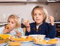 Two little girls with cream desserts royalty free stock photos Two little girls with cream desserts royalty free stock photos