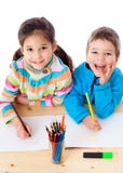 Two Little Kids Draw With Crayons Royalty Free Stock Photo