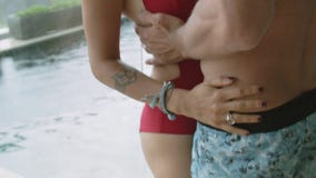 Two lovers hug in the villa with the pool stock video Two lovers hug in the villa with the pool stock video