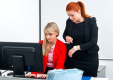 Two nervous colleague workers in office with computer Stock Photo Two nervous colleague workers in office with computer Stock Photo