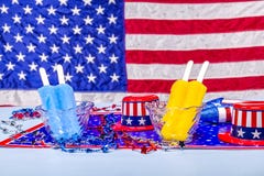 Melting popsicles on patriotic background Royalty Free Stock Photos Melting popsicles on patriotic background Royalty Free Stock Photos