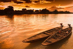 Two Rowing Boat Boats Are Tied To The Shore. Stock Photo Two Rowing Boat Boats Are Tied To The Shore. Stock Photo