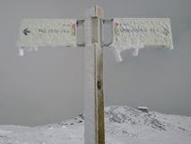 Signs covered by snow on the mountain stock photos Signs covered by snow on the mountain stock photos