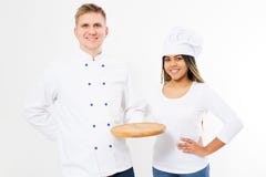 Two smiling chefs hold empty pizza desk isolated on white background royalty free stock image Two smiling chefs hold empty pizza desk isolated on white background royalty free stock image
